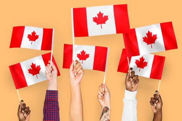 hands-waving-flags-canada